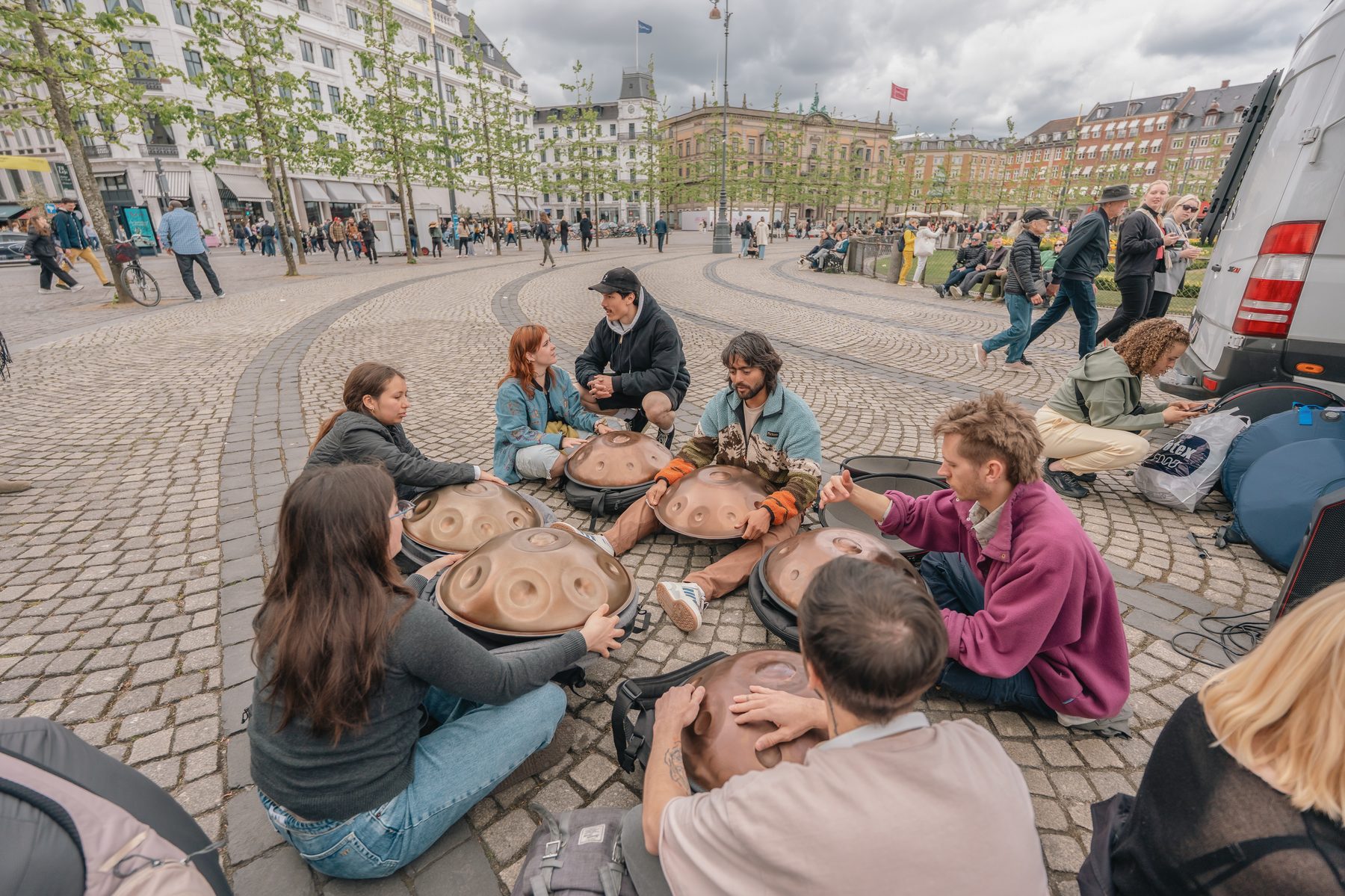 A group of players gathered in a community handpan event